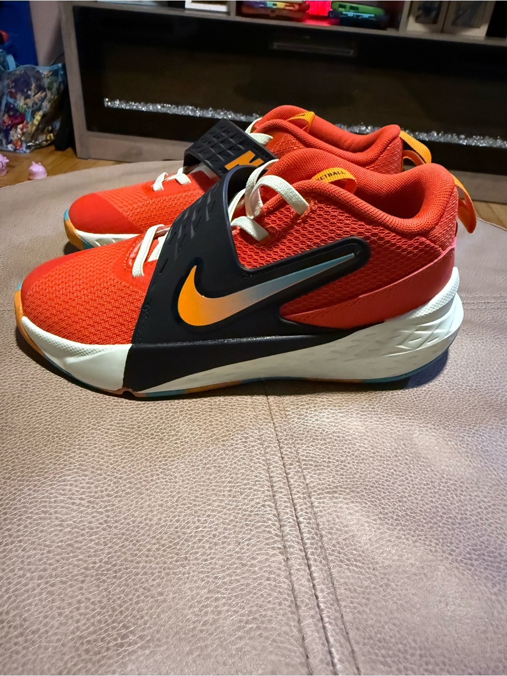 Nike Kids Red and Black Basketball Sneakers with Yellow Swoosh